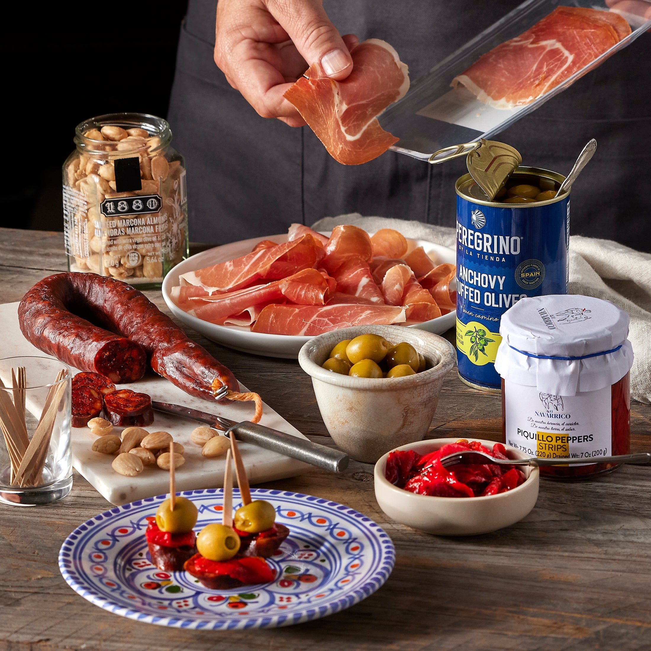 Photo of Five Flavors of Spain Sampler displayed on dishes