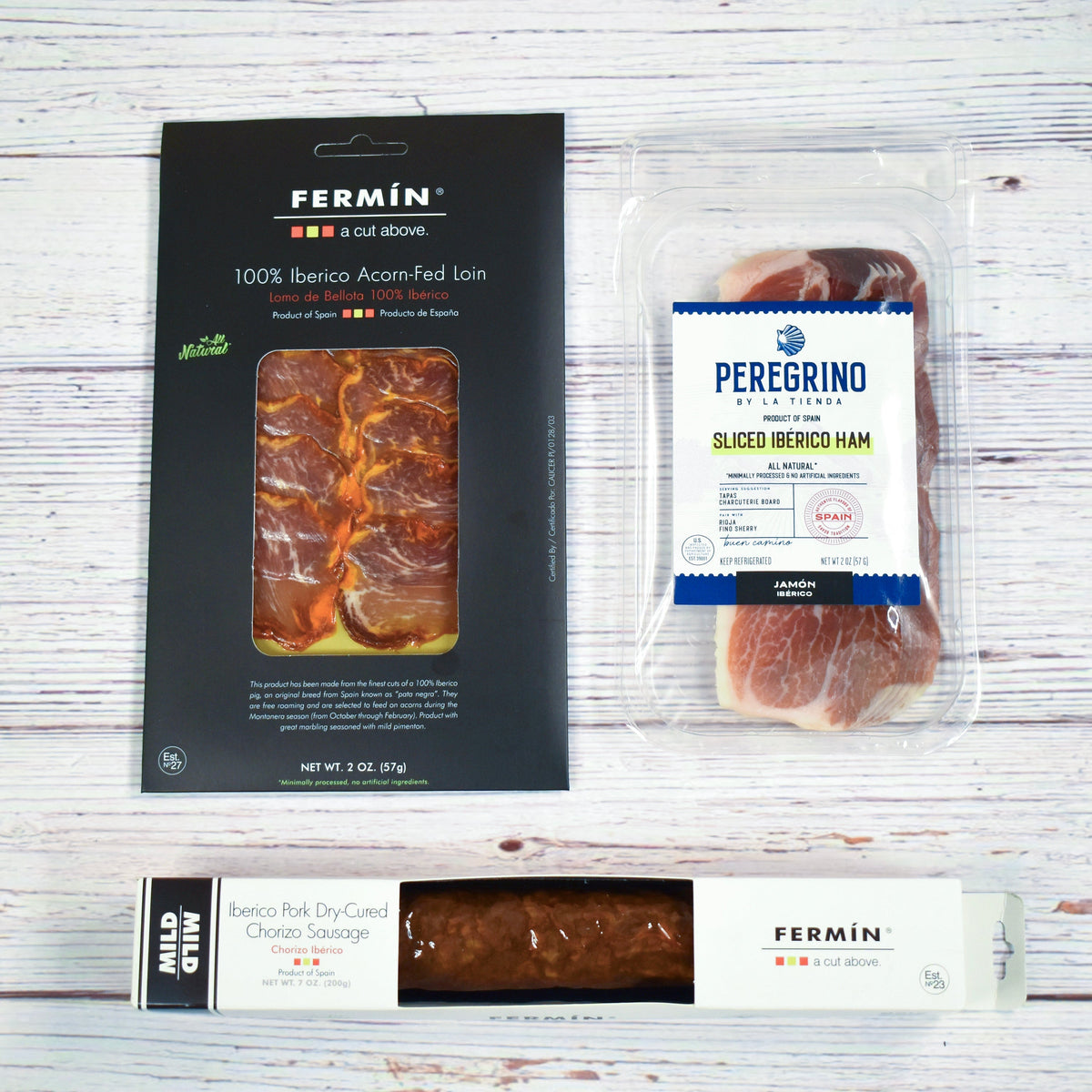 Photo of a charcuterie board with a variety of cured Iberico meats